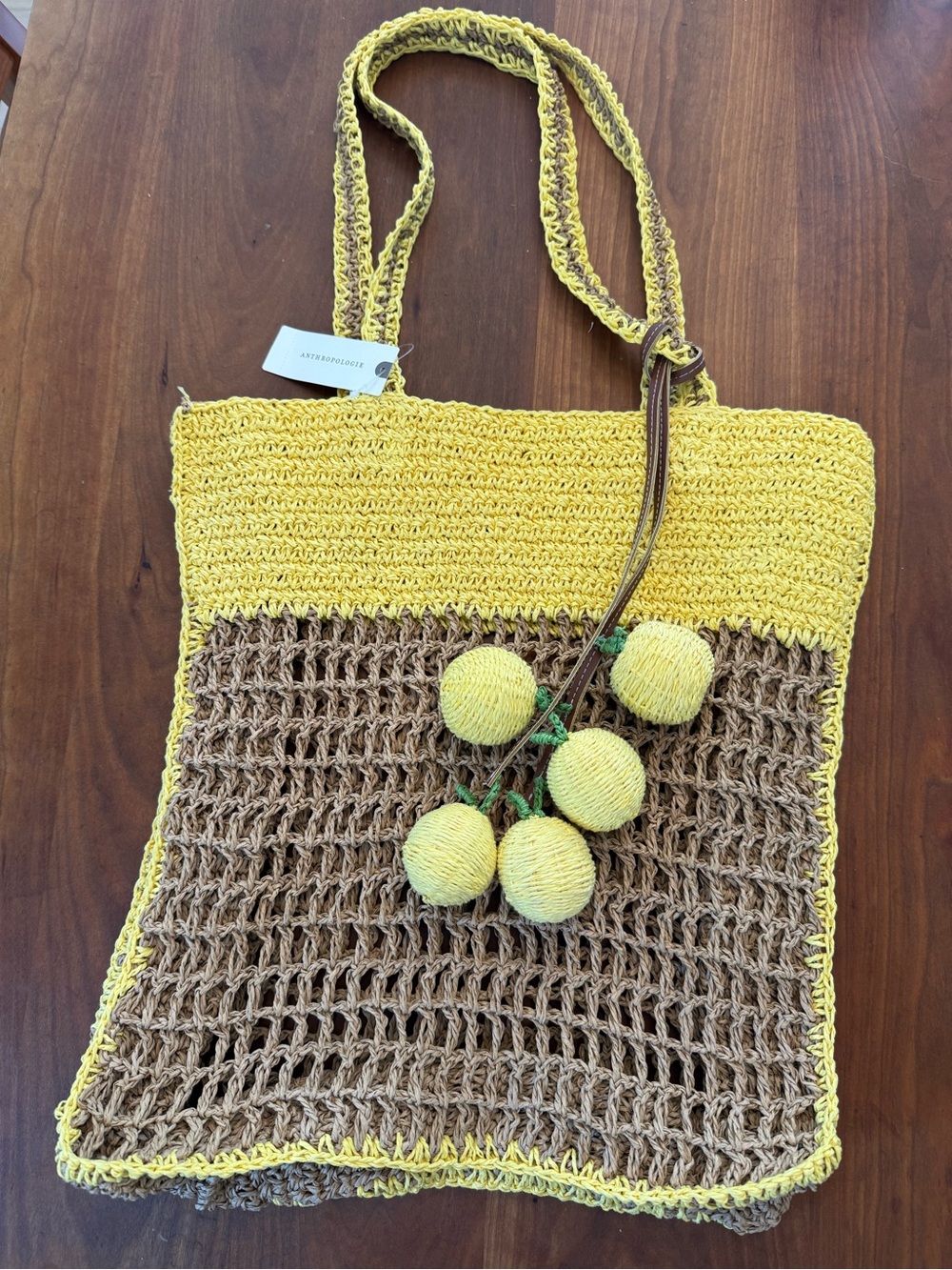 ANTHROPOLOGIE LEMON Yellow & Brown Crochet Tote Bag with Pom Pom Charm NWT cute!